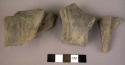 Fragments of pottery ansa lunata handles
