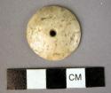Shell button or bead, discoidal, rounded on one side, polished, perforated