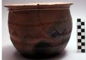 Red pottery vessel with incised designs. Tachu