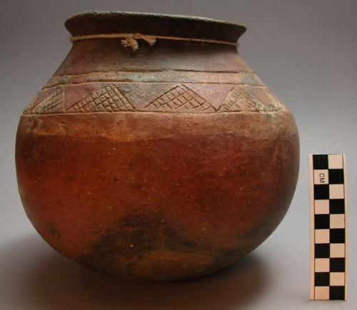 Pottery vessel with incised designs. Nsuku