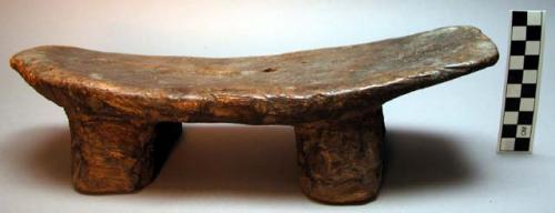 Wooden stool with small legs.  Ichitengo