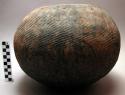 Globular pot, textile (?) marked