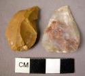 2 chert and calcedony sub-triangular flakes showing signs of use