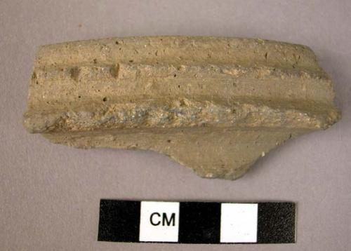 Rim potsherd - applique decorated grey ware