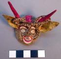 Miniature plaster mask - green grotesque face, white eyes, cerise +