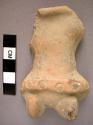 Figurine fragment; clay; torso and legs.