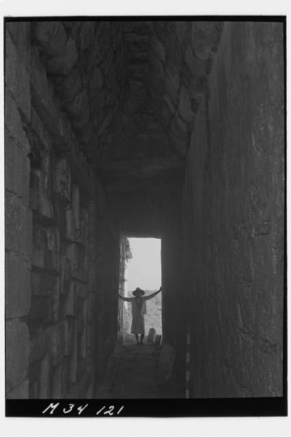 Passage beneath second story stairs at the second story of Monjas.