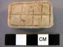 Stone amulet - incised decoration; 1 1/2"x3/4"