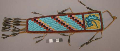 Multicolored beaded knife sheath - geometric design with flower motif *