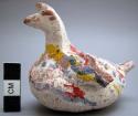 Pottery bird. White painted red ware with red, yellow and blue decoration