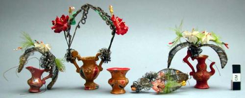 Miniature vases with artificial flowers