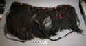 Leather fringed skirt, round & tubular glass beads, leather ties, loose beads