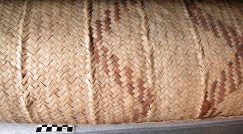 Large mat of palmetto with brown geometric designs