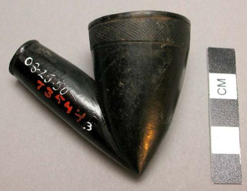 Pipe, rounded ceramic bowl, black slip, peaked base, incised design at rim