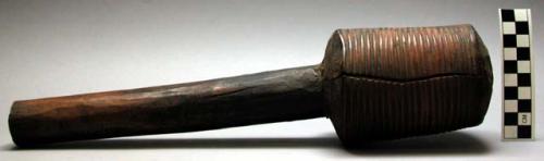Wooden mallet, corrugated cylinder with 9.5" handle, used for beating bark(sangu