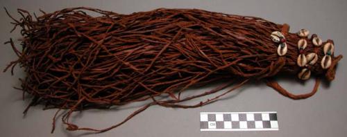 Complete costume of nubian girl, consists of many leather strips attached to str