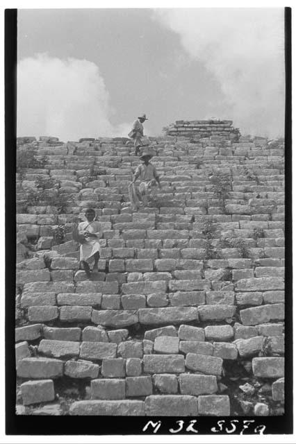 Workmen on main stairs at Monjas