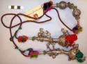 Silver alloy hair ornament on wool cord with multi-colored tassels (chotil)