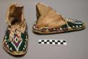 Pair of beaded leather moccasins - woman's