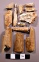 Bone, carved tube fragments, some mended, shell? fragments