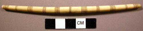 Ivory implement for tightening strings of pack with incised linear design