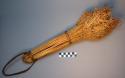Broom, bundle of dried grass stalks bound w/ veg. fiber, bark loop