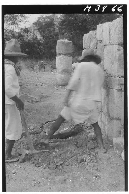 Monjas - Metate in passage N.W. corner E. building