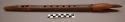 Teton Sioux carved flute. Split piece of wood hollowed out and put back together