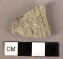 Ceramic body sherd, coarse grey ware, impressed