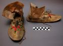 Pair of Plains quilled moccasins, possibly Sioux. 1 sole made from parfleche.