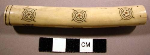 Needle case, tubular bone or ivory, incised & pigmented geomteric design, inlaid