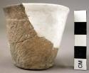 Ceramic cup, miniature, brown, surface scored and incised, reconstructed