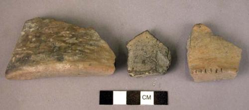 3 fragments of pottery mugs