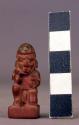 Tiny kneeling stone figurine - inlays on headdress