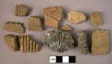 Ceramic, earthenware, body and rim sherds with incised, impressed and punctate decoration and pipe stem fragments