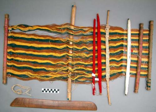 Dowel, carved wood,  plain handles, red dye bands