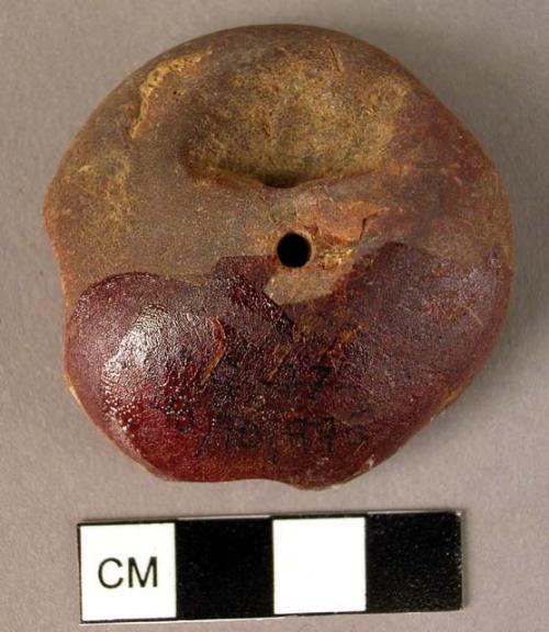 Disk-shaped amber pendant, double-drilled