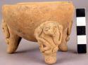 Pottery dish, tripod, plain, legs solid + carved, human form