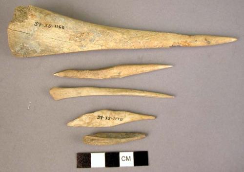 Organic, bone perferators or awls, modified animal bone shafts