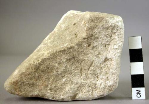 Small limey sandstone quern fragment