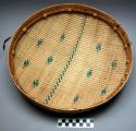Winnowing palmetto basket made by the men