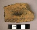 Rim sherd - polished black ware with raised, indented, decorative band