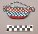 Small beaded cloth pouch with handle of beads