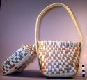 Straw carrying basket with plaited handle