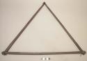 Triangle of 3 pieces of wood , bound at the corners w/ vegetable fiber