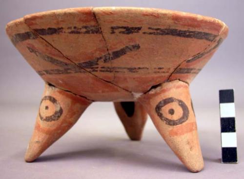 Restored polychrome pottery tripod bowl