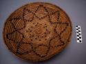 Small basket trays, coiled. Made of bear grass (natural and dyed).