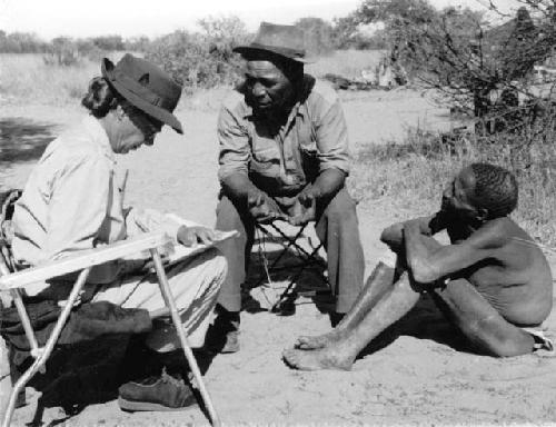 Man being interviewed by Lorna Marshall, with Kernel Ledimo interpreting