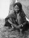 Shamba or N!ame (wife of Majola) sitting