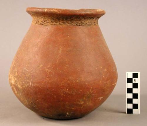 Large jar, red ware.  Incised decoration.